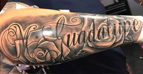 roses tatoo done by Rene Pain ink Queens